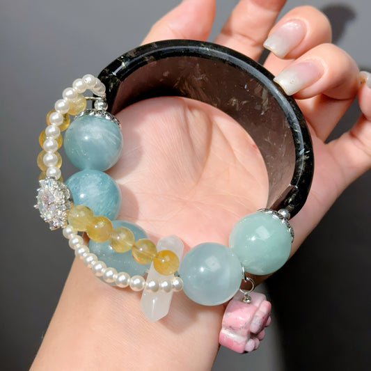002 Astrophyllite Aquamarine Fluorite bracelet