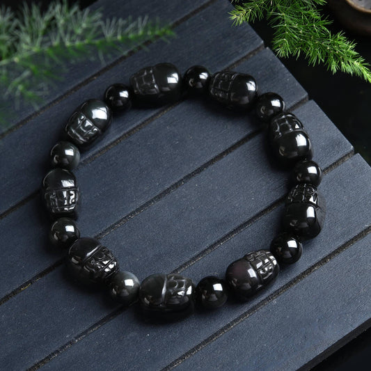 065  Rainbow obsidian piyao bracelet. Eight piyao bracelet